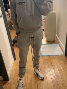 New Essentials Dark Grey pants in extra small including dust bag